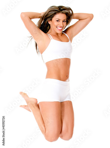 Photo: Happy woman jumping Happy woman jumping