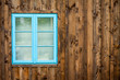 Old home with blue window background