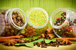 Foto: Pack of several spices and herbs in glass jars Pack of several spices and herbs in glass jars