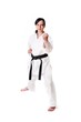 Karate woman posing on a white background