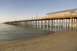 Photo: The sun setting on the pier and the Atlantic Ocean in Virginia Beach, Virginia The sun setting on the pier and the Atlantic Ocean in Virginia Beach, Virginia