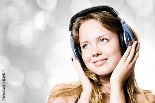 Photo: beautiful sexual woman in headphones beautiful sexual woman in headphones