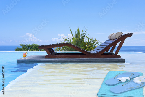 Photo: piscine, serviette, tongs et cocktail de bienvenue piscine, serviette, tongs et cocktail de bienvenue