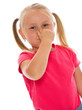 little girl covering nose