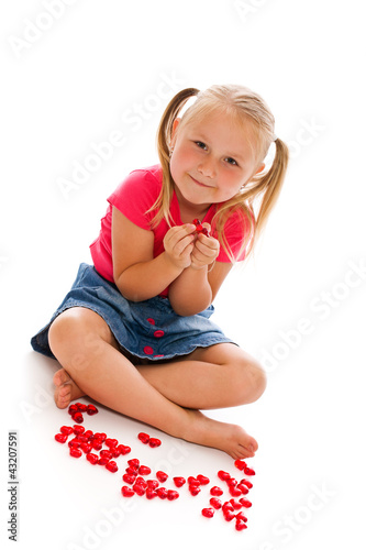 Photo: little girl with red hearts little girl with red hearts