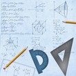mathematical desk with formulas and equipment