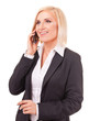 happy female executive speaking on a cellphone