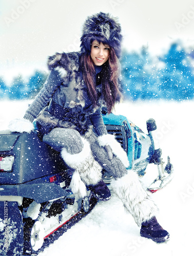 Photo: Beauty woman in the winter scenery Beauty woman in the winter scenery
