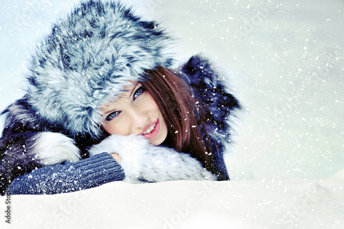 Photo: Beauty woman in the winter scenery Beauty woman in the winter scenery