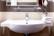 Photo: White sink and towell in SPA salon. White sink and towell in SPA salon.