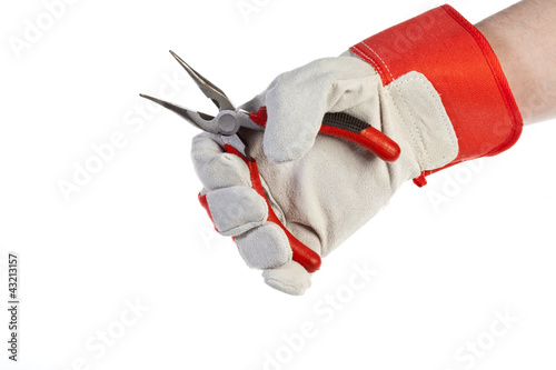 Photo: Hand with protection glove holding Pliers Hand with protection glove holding Pliers