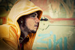 Young man portrait on graffiti grunge wall