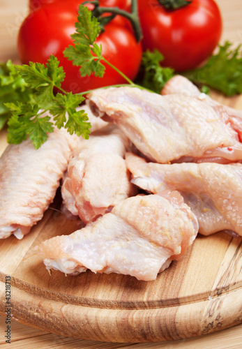 Photo: Raw chicken wings Raw chicken wings