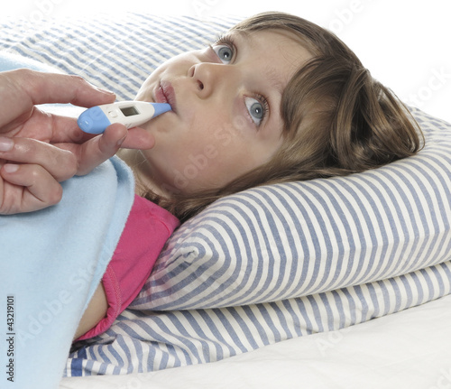 Photo: mother measures the temperature of her ill daughter .. mother measures the temperature of her ill daughter ..