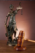 Law and justice stuff on wood table and dark background 