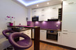 Modern living room interior with kitchen