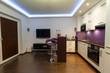 Modern living room interior with kitchen