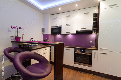Photo: Modern living room interior with kitchen Modern living room interior with kitchen