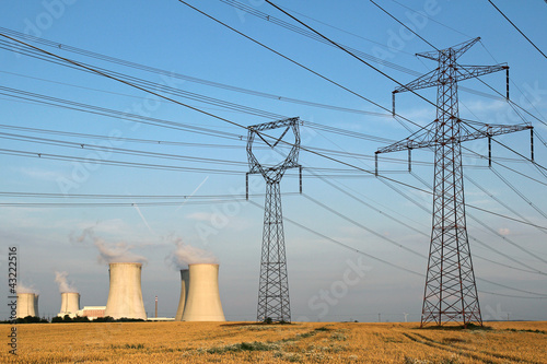 Photo: high voltage towers and nuclear power plant high voltage towers and nuclear power plant