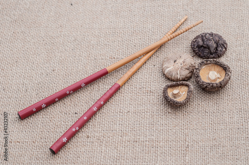 Photo: Shiitake mushrooms on jute background Shiitake mushrooms on jute background