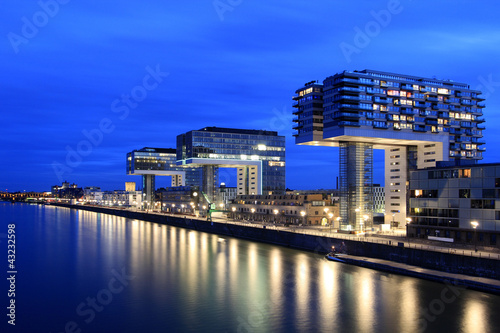 Photo: Cologne - Crane Houses from Rhine at Sunset Cologne - Crane Houses from Rhine at Sunset