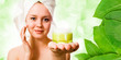 Photo: Young girl with towel on her head and cream. Young girl with towel on her head and cream.