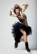 Performance. Retro girl in old-fashioned wild clothing dancing