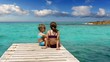 little sisters girls looking idyllic beach landscape