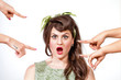 Photo: Blamed girl looking shocked with fingers pointed at her Blamed girl looking shocked with fingers pointed at her