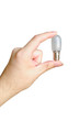 hand with bulb isolated on white background
