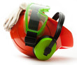 Red safety helmet with earphones, goggles and gloves