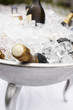 Bottles of champagne cooling on ice