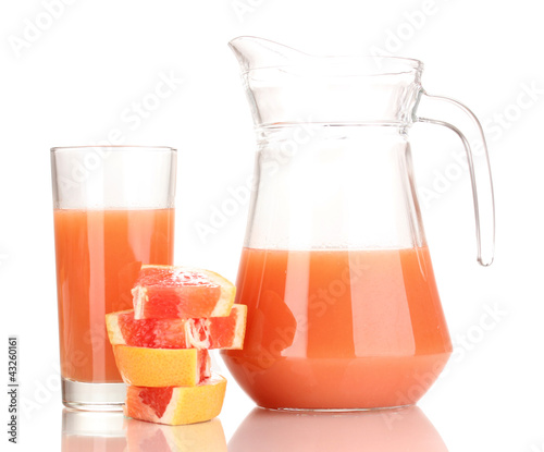 Photo: Sliced grapefruit and juice isolated on white Sliced grapefruit and juice isolated on white