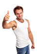 Photo: Portrait of a muscular young man, thumb up Portrait of a muscular young man, thumb up