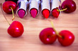 bright red lipsticks and cherries