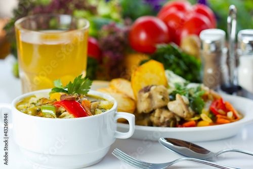 Photo: Business lunch with soup, salad and juice Business lunch with soup, salad and juice