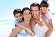 Closeup of happy family at the beach