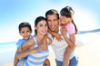 Closeup of happy family at the beach