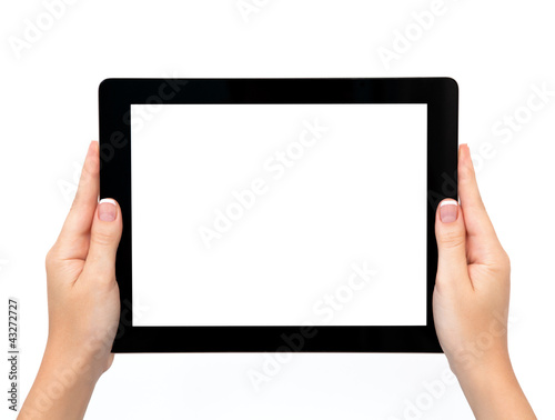 Photo: female hands holding a tablet female hands holding a tablet