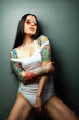 sexy glamorous girl with tattoos.
