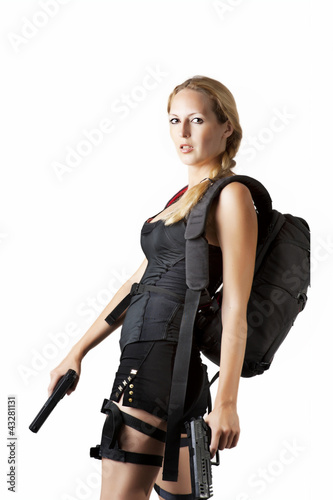 Photo: Sexy female model with two hand guns Sexy female model with two hand guns