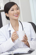 Chinese Female Woman Doctor Drinking Coffee or Tea