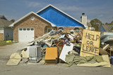 Photo: "Help or LeaveÓ sign with debris in front of house heavily hit by Hurricane Ivan in Pensacola Florida "Help or LeaveÓ sign with debris in front of house heavily hit by Hurricane Ivan in Pensacola Florida