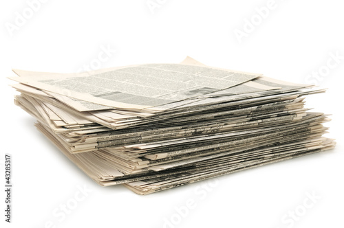 Photo: newspapers isolated on white background newspapers isolated on white background