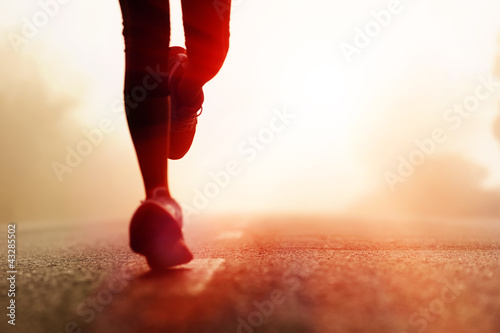Photo: Athlete running road silhouette Athlete running road silhouette