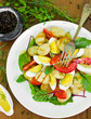 Salad with grilled potatoes, tomatoes and boiled eggs