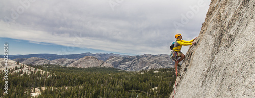 Photo: Rock climber on the edge. Rock climber on the edge.