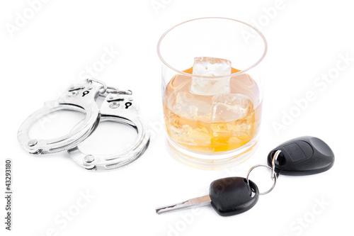 Photo: Handcuff a whiskey and a car key Handcuff a whiskey and a car key