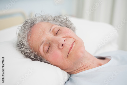 Foto: Patient sleeping on a medical bed Patient sleeping on a medical bed