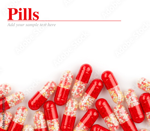Photo: close up of red medical capsules close up of red medical capsules